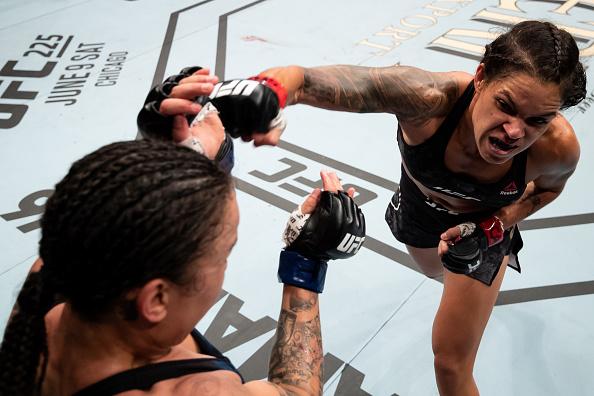 RIO DE JANEIRO, BRAZIL - MAY 12: Amanda Nunes ( R) of Brazil punches Raquel Pennington of the United States in their women's bantamweight bout during the UFC 224 event at Jeunesse Arena on May 12, 2018 in Rio de Janeiro, Brazil. (Photo by Buda Mendes/Zuff