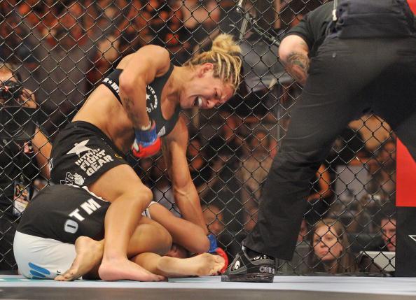 SAN JOSE, CA - AUGUST 15: Cris Cyborg (Top) battles Gina Carano during their Middleweight Championship fight at Stikeforce: Carano vs. Cyborg on August 15, 2009 in San Jose, California. (Photo by Jon Kopaloff/Getty Images)
