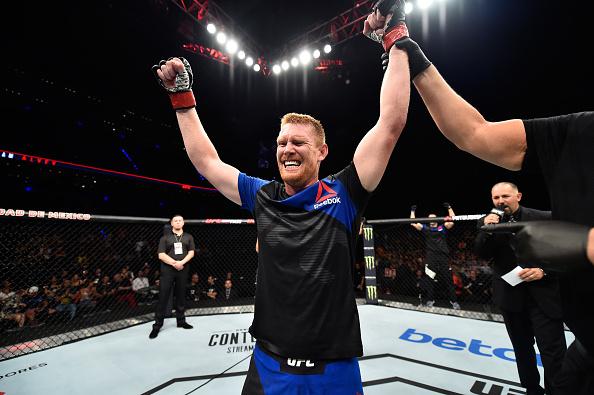 MEXICO CITY, MEXICO - AUGUST 05: Sam Alvey celebrates his victory over Rashad Evans in their middleweight bout during the UFC Fight Night event at Arena Ciudad de Mexico on August 5, 2017 in Mexico City, Mexico. (Photo by Jeff Bottari/Zuffa LLC/Zuffa LLC