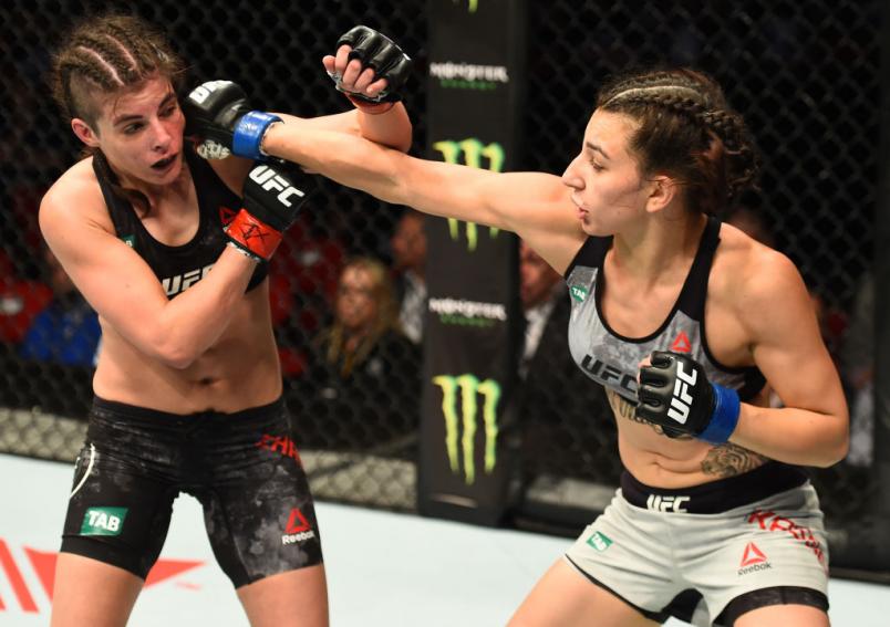 SYDNEY, AUSTRALIA - NOVEMBER 19: (R-L) Nadia Kassem punches Alex Chambers of Australia in their women's strawweight bout during the UFC Fight Night event inside the Qudos Bank Arena on November 19, 2017 in Sydney, Australia. (Photo by Josh Hedges/Zuffa L