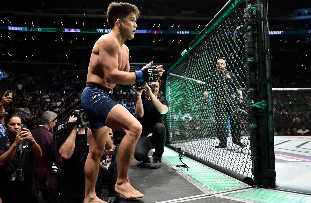 LOS ANGELES, CA - AUGUST 04: Henry Cejudo prepares to fight Demetrious Johnson in their UFC flyweight championship fight during the UFC 227 event inside Staples Center on August 4, 2018 in Los Angeles, California. (Photo by Jeff Bottari/Zuffa LLC/Zuffa LLC via Getty Images)