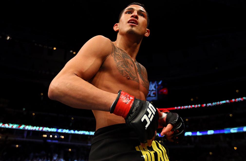CHICAGO, IL - JANUARY 26: Anthony Pettis celebrates defeating Donald Cerrone during their Lightweight Bout part of UFC on FOX at United Center on January 26, 2013 in Chicago, Illinois. (Photo by Al Bello/Zuffa LLC/Zuffa LLC Via Getty Images)