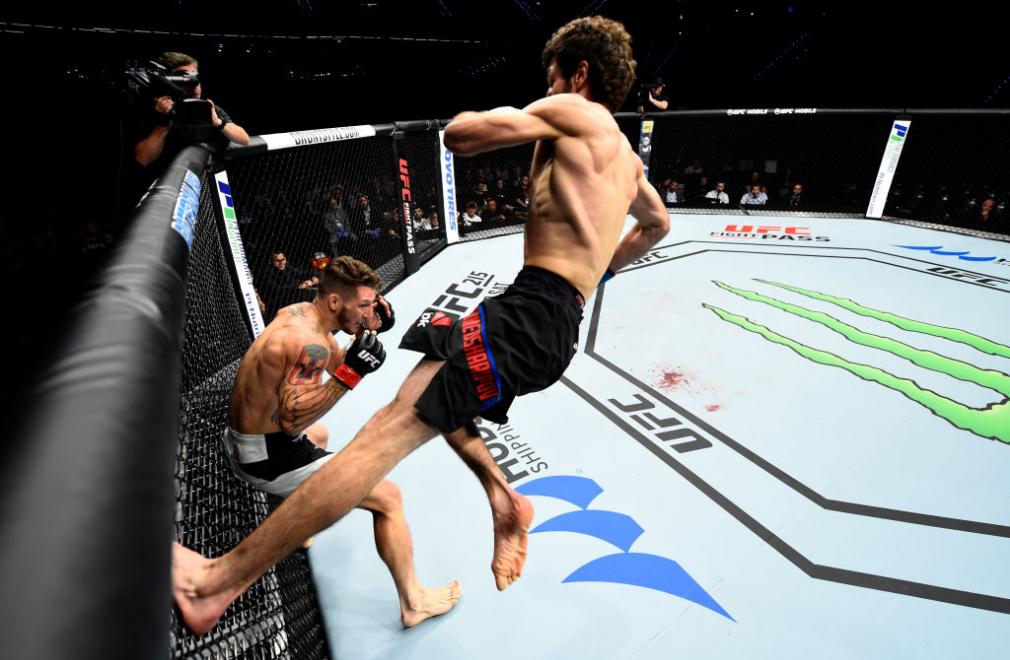 ROTTERDAM, NETHERLANDS - SEPTEMBER 02: (R-L) Zabit Magomedsharipov of Russia jumps off the wall of the Octagon to kick Mike Santiago in their featherweight bout during the UFC Fight Night event at the Rotterdam Ahoy on September 2, 2017 in Rotterdam, Net