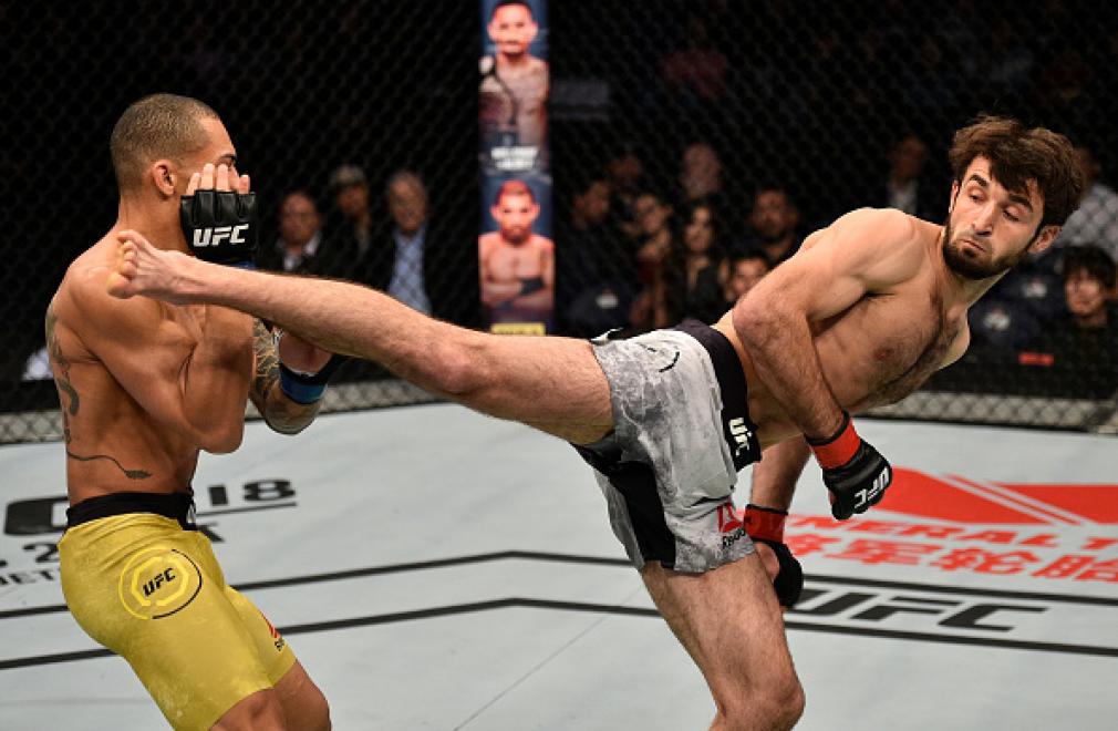 SHANGHAI, CHINA - NOVEMBER 25: (R-L) Zabit Magomedsharipov of Russia kicks Sheymon Moraes of Brazil in their featherweight bout during the UFC Fight Night event inside the Mercedes-Benz Arena on November 25, 2017 in Shanghai, China. (Photo by Brandon Mag